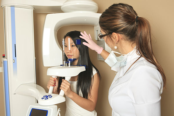 Patient receiving X-Rays from 3D Cone Beam from Downey Oral and Maxillofacial Surgery in Downey, CA